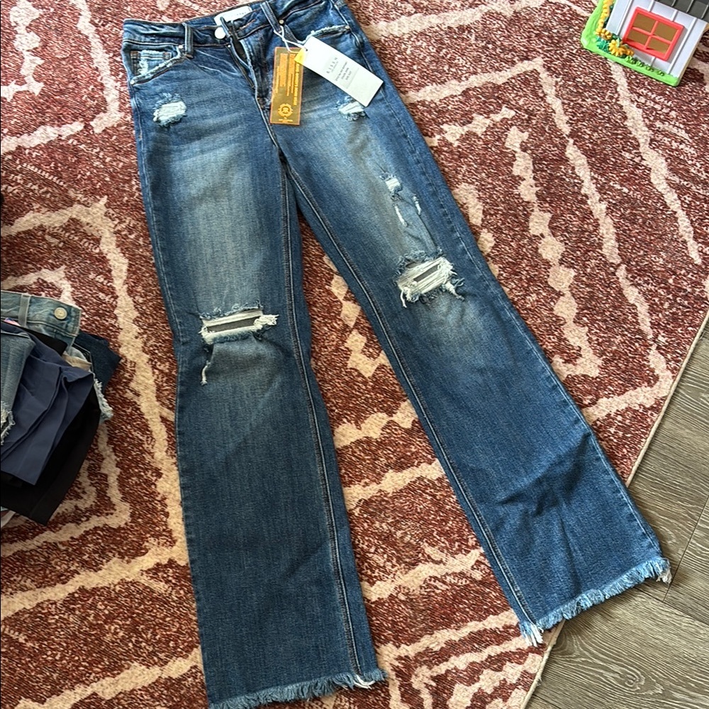Distressed Blue Jeans